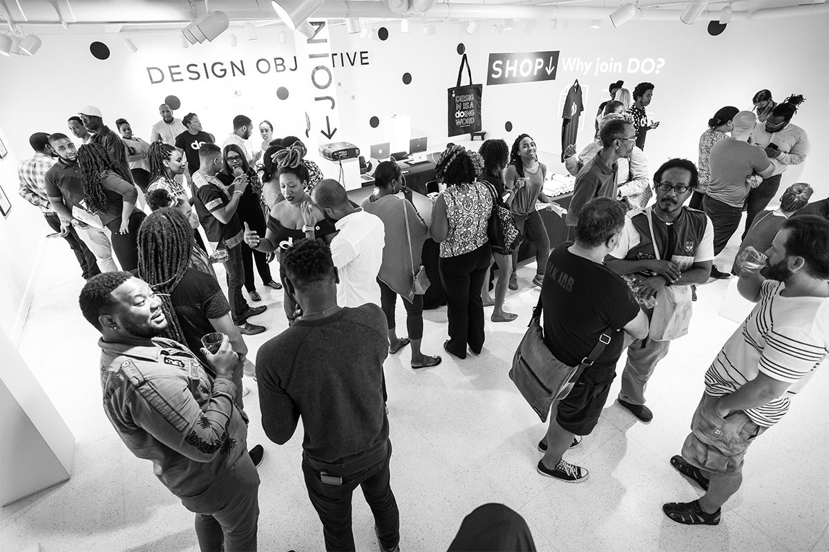 A Photo of a crowd of people at a Design Objective Event